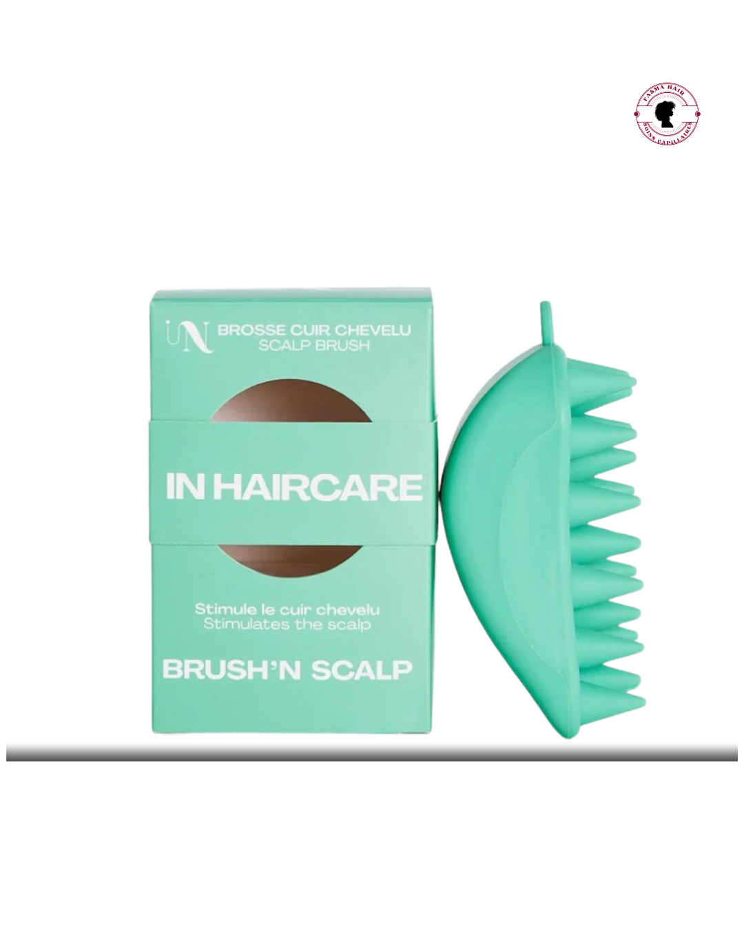 Brosse scalp en silicone verte In Haircare pour stimuler et purifier le cuir chevelu.